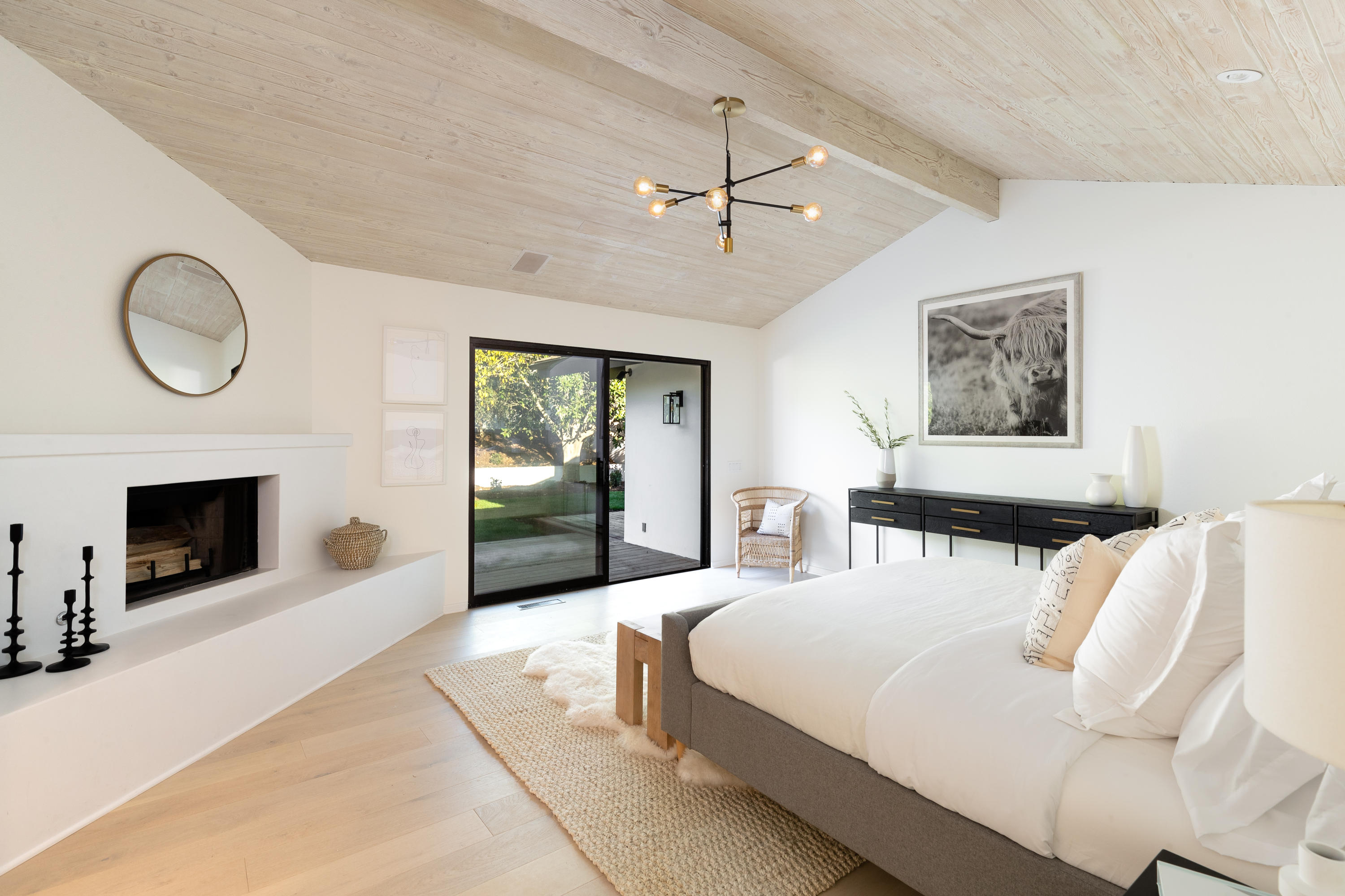 4671 La Espada Drive Santa Barbara, CA 93111 - Photo 12 of 37 a bedroom with a bed and a fireplace