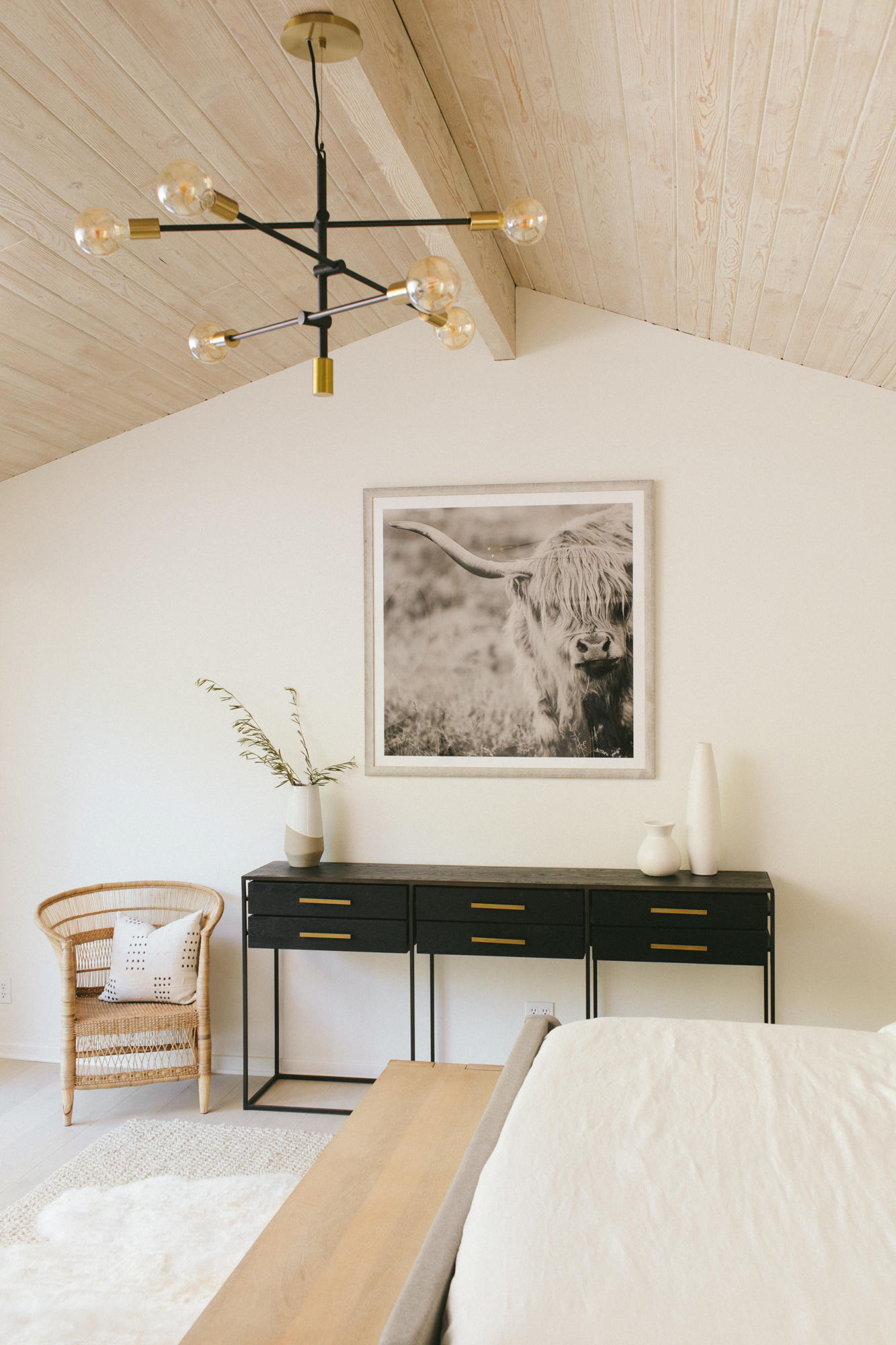 4671 La Espada Drive Santa Barbara, CA 93111 - Photo 13 of 37 a bedroom with a bed and a painting on the wall