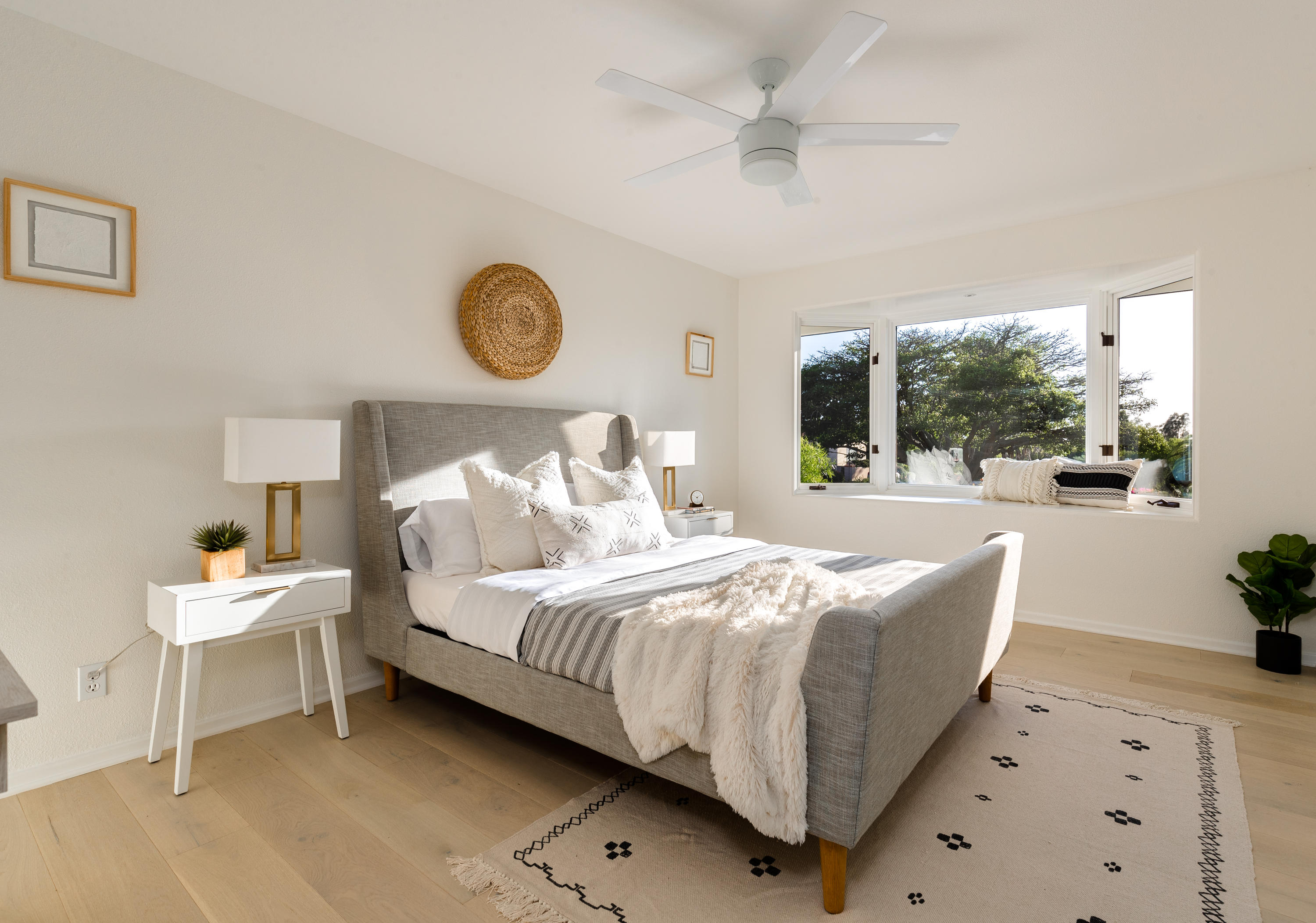 4671 La Espada Drive Santa Barbara, CA 93111 - Photo 21 of 37 a bedroom with a bed and a lamp with window