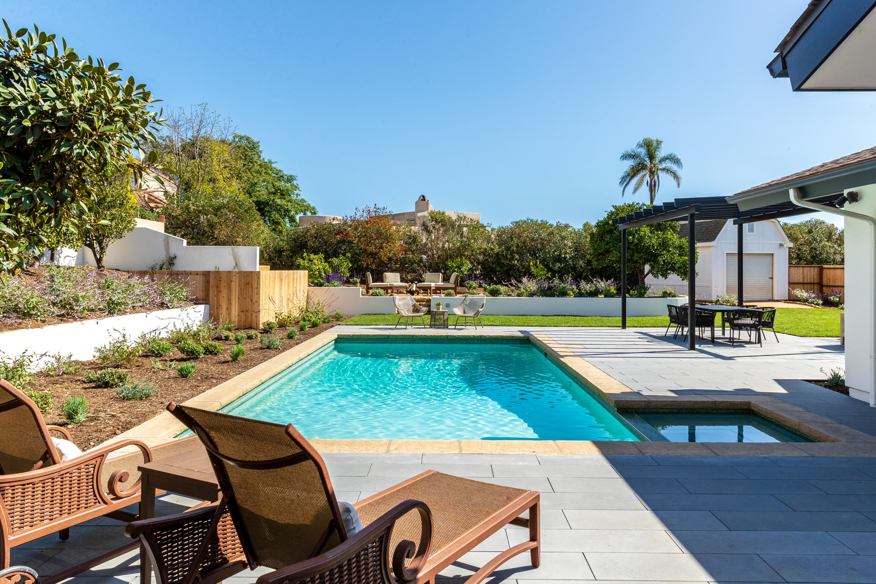 4671 La Espada Drive Santa Barbara, CA 93111 - Photo 32 of 37 a view of a swimming pool with lounge chairs