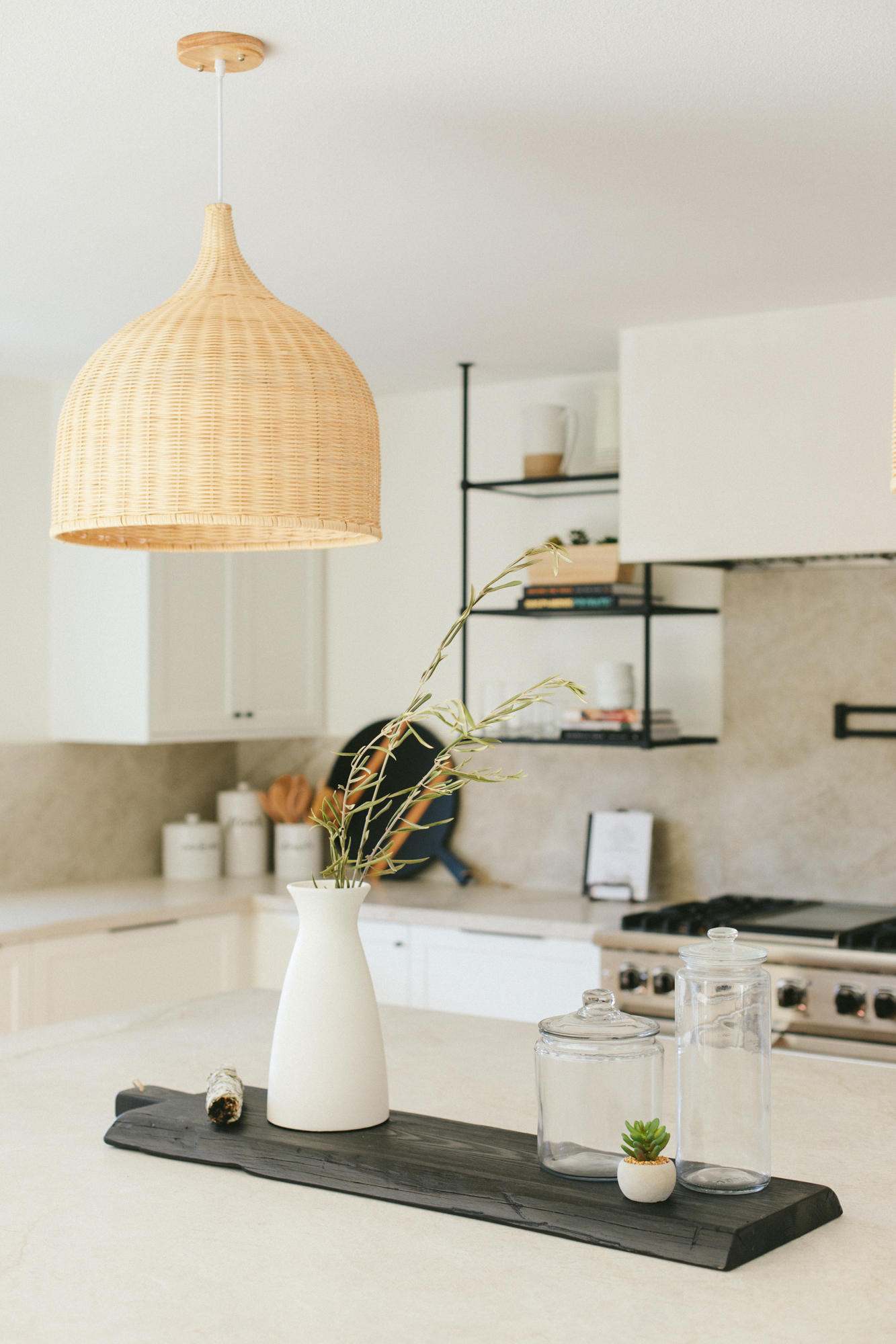 4671 La Espada Drive Santa Barbara, CA 93111 - Photo 6 of 37 a kitchen with a stove a sink and a white cabinets