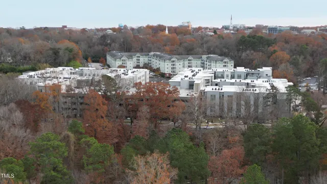 a view of a town with mountains in the background