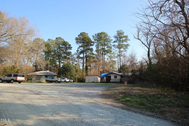 a view of street with parked cars