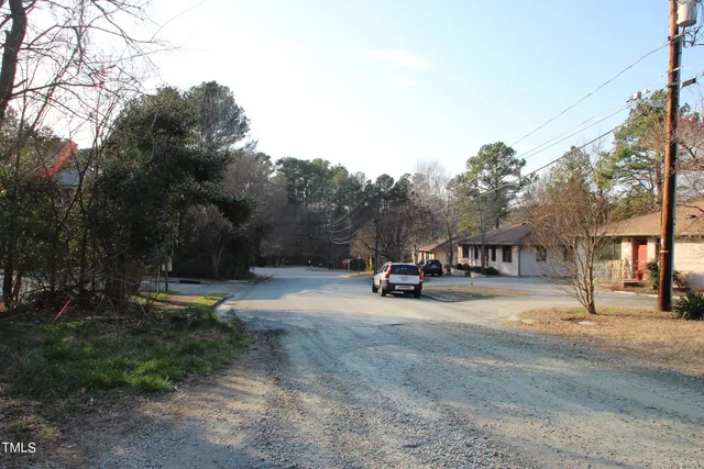 a view of a park with of swings and slides