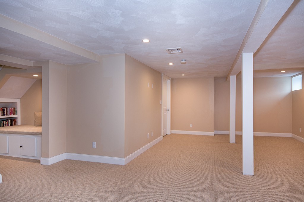 201 Beaver Dam Road Scituate, MA 02066 - Photo 18 of 21 an empty room with closet and windows