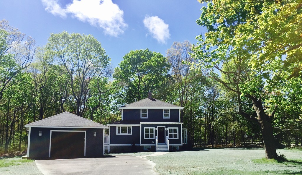 201 Beaver Dam Road Scituate, MA 02066 - Photo 21 of 21 a front view of a house with yard and trees