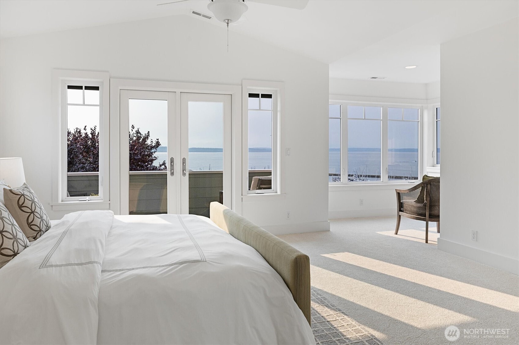 6703 36th Avenue Northwest Seattle, WA 98117 - Photo 20 of 40 a bedroom with a bed and a view of living room