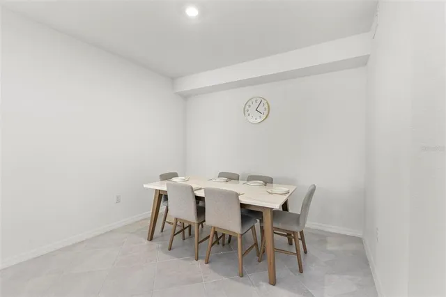 a bathroom with a double vanity sink mirror and shower