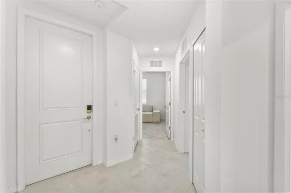 a bathroom with double vanity sink and a mirror