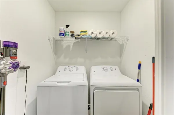 a spacious bathroom with a double vanity sink mirror and