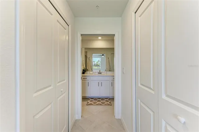 a view of a porch with furniture and garden