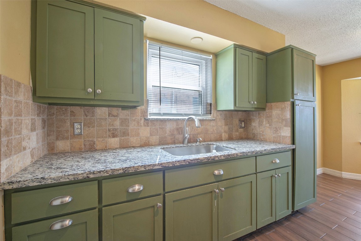 504 Raymond Street La Marque, TX 77568 - Photo 13 of 22 a sink with cabinets