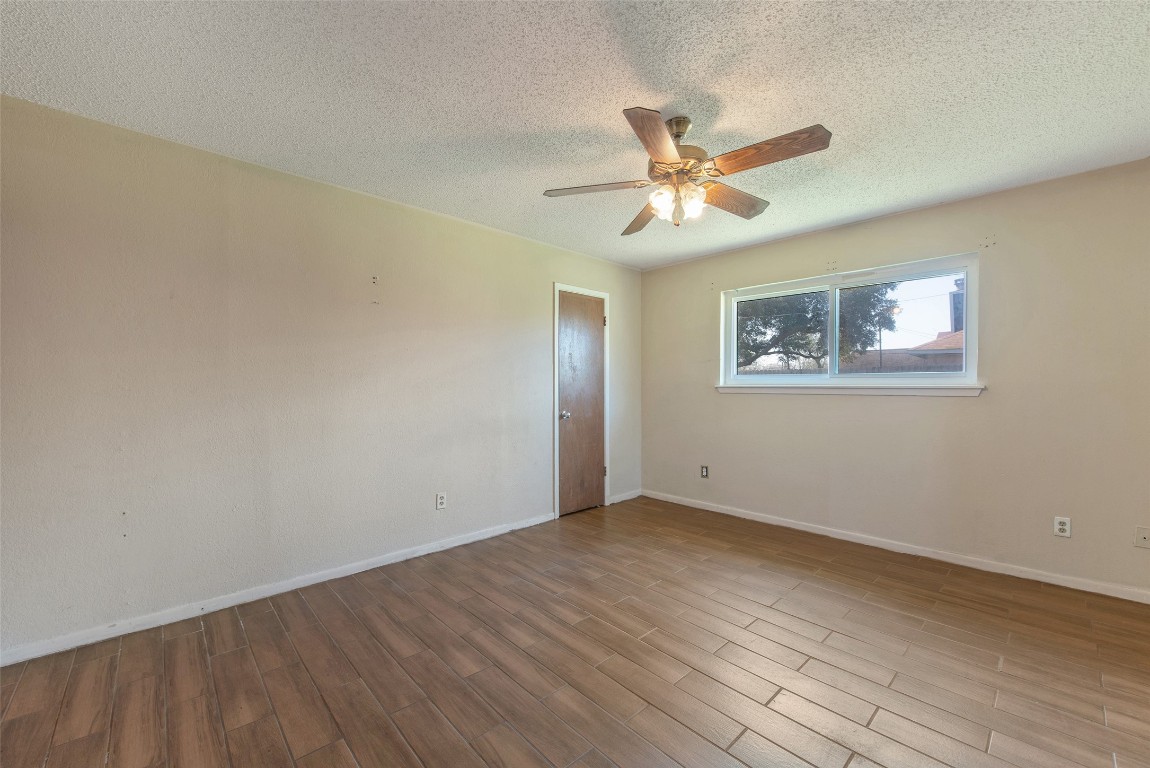 504 Raymond Street La Marque, TX 77568 - Photo 17 of 22 a view of an empty room with a window