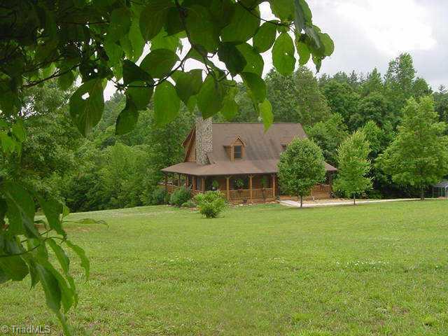 1211 Stevens Road Westfield, NC 27053 - Photo 1 of 9 Exterior Front. Tremendous rd frontage, huge front yard