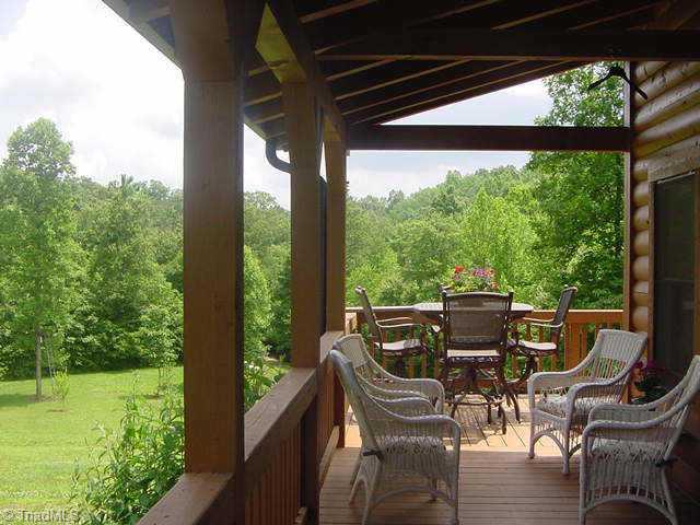 1211 Stevens Road Westfield, NC 27053 - Photo 4 of 9 Other. 3 sides of porches and deck,room for swing and rockers