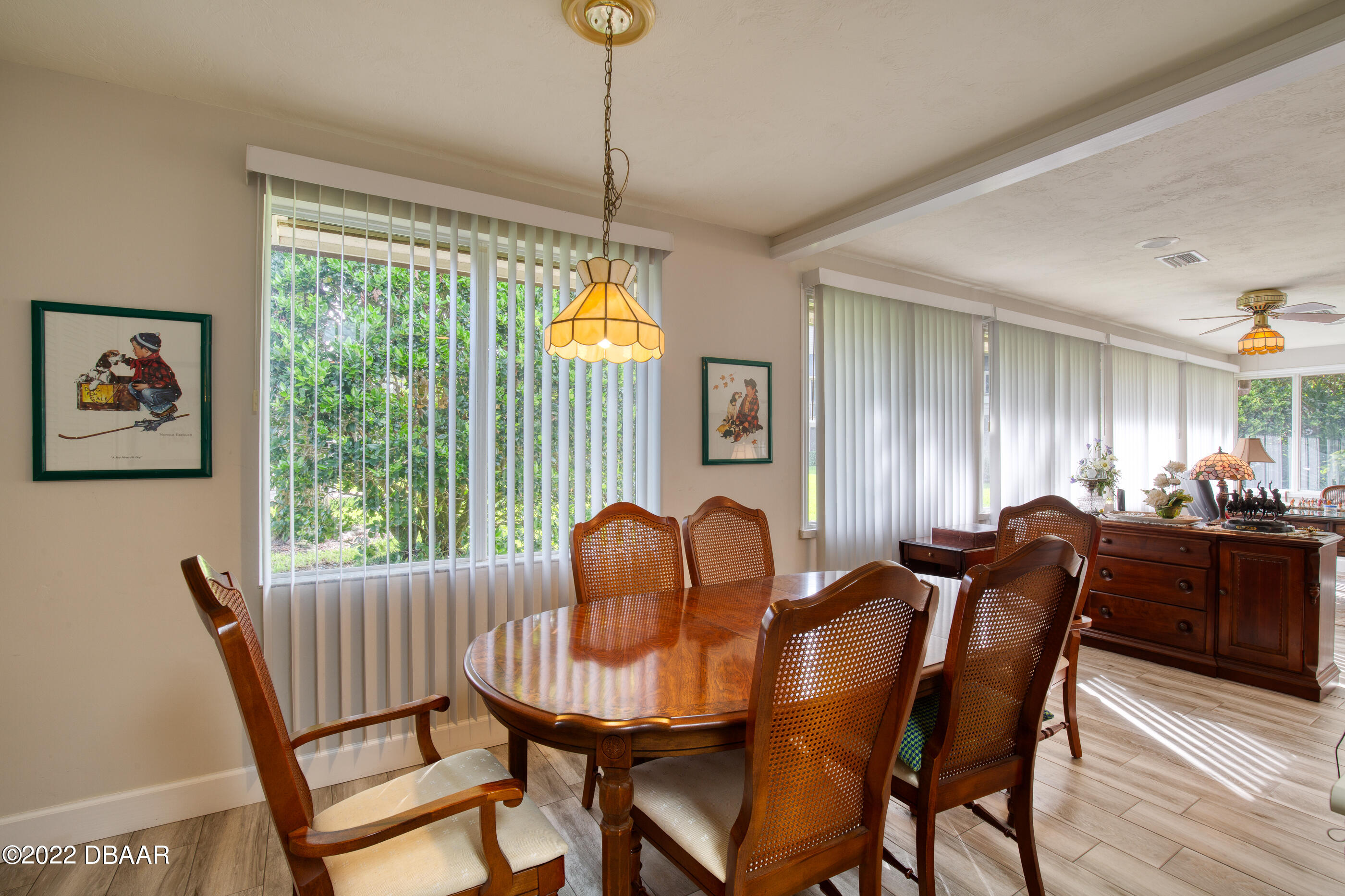 4 Jasmine Run Ormond Beach, FL 32174 - Photo 13 of 18 a view of a dining room with furniture window and wooden floor