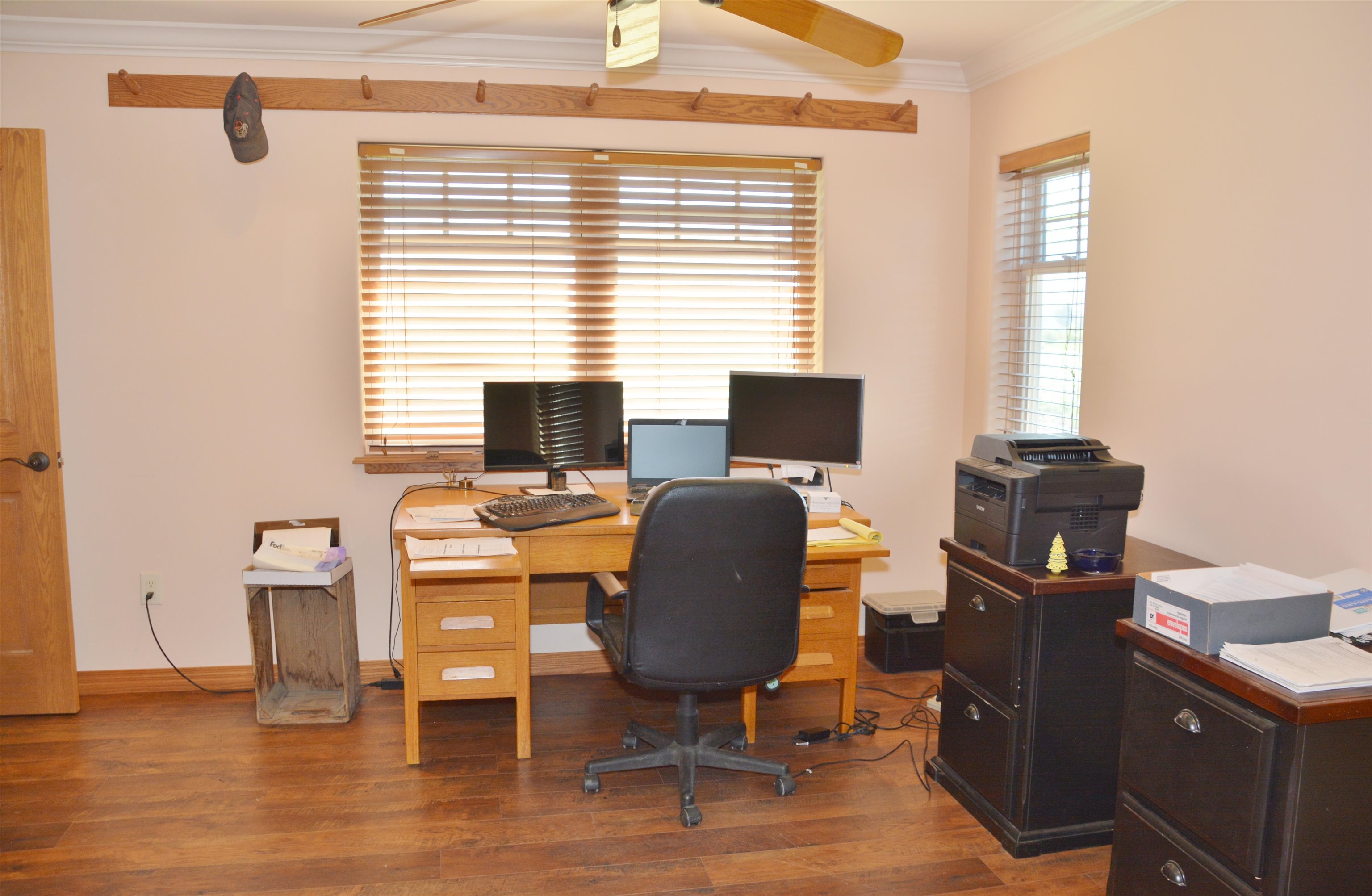 3525 G Road Palisade, CO 81526 - Photo 6 of 9 a view of a workspace with furniture and a window