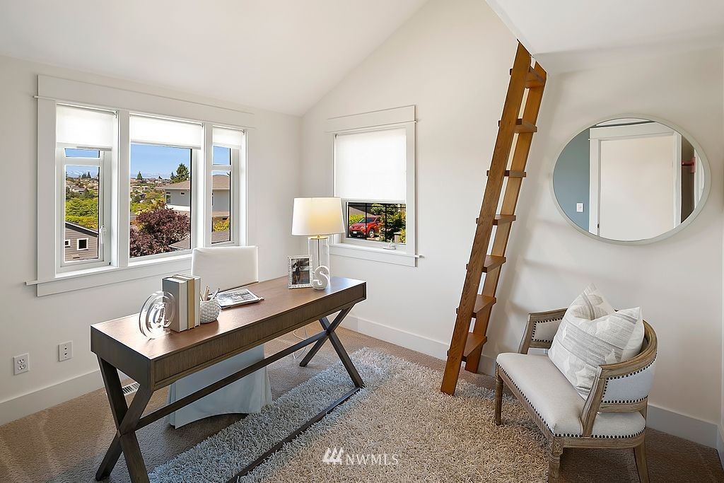 2801 28th Avenue West Seattle, WA 98199 - Photo 27 of 39 a living room with furniture and a window