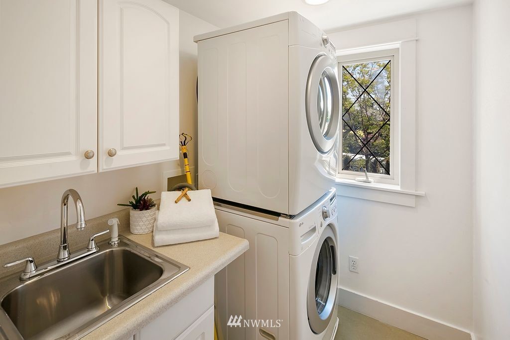 2801 28th Avenue West Seattle, WA 98199 - Photo 28 of 39 a utility room with dryer and washer