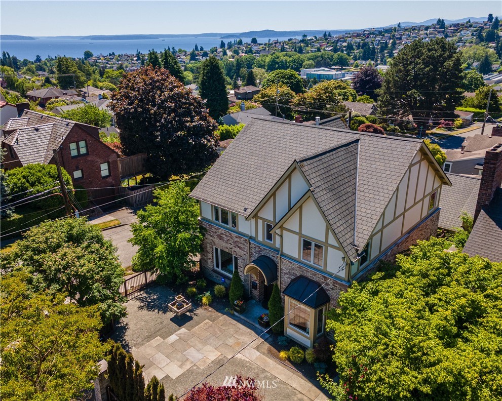 2801 28th Avenue West Seattle, WA 98199 - Photo 32 of 39 an aerial view of a house with a garden and lake view
