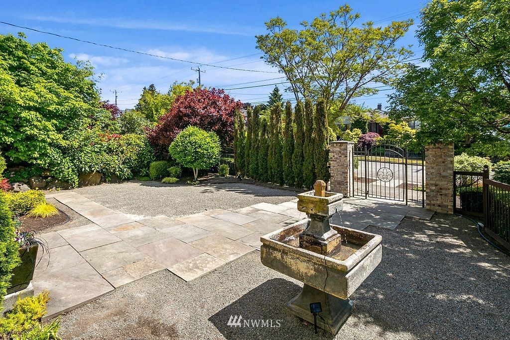 2801 28th Avenue West Seattle, WA 98199 - Photo 35 of 39 a view of a bench in a backyard