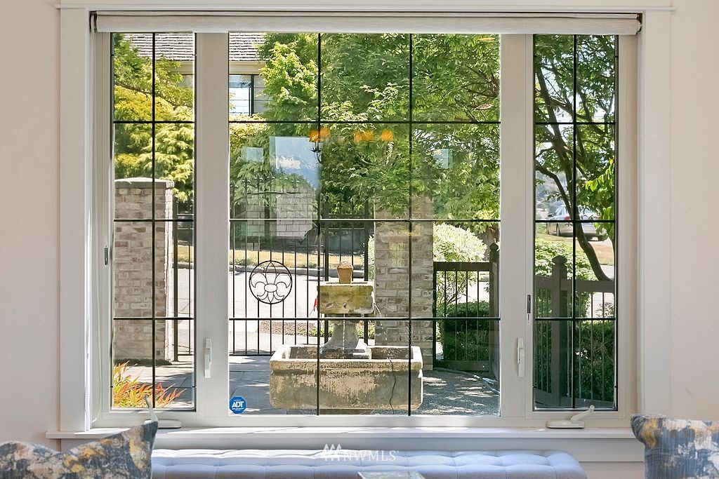 2801 28th Avenue West Seattle, WA 98199 - Photo 6 of 39 a view of a glass door and a yard
