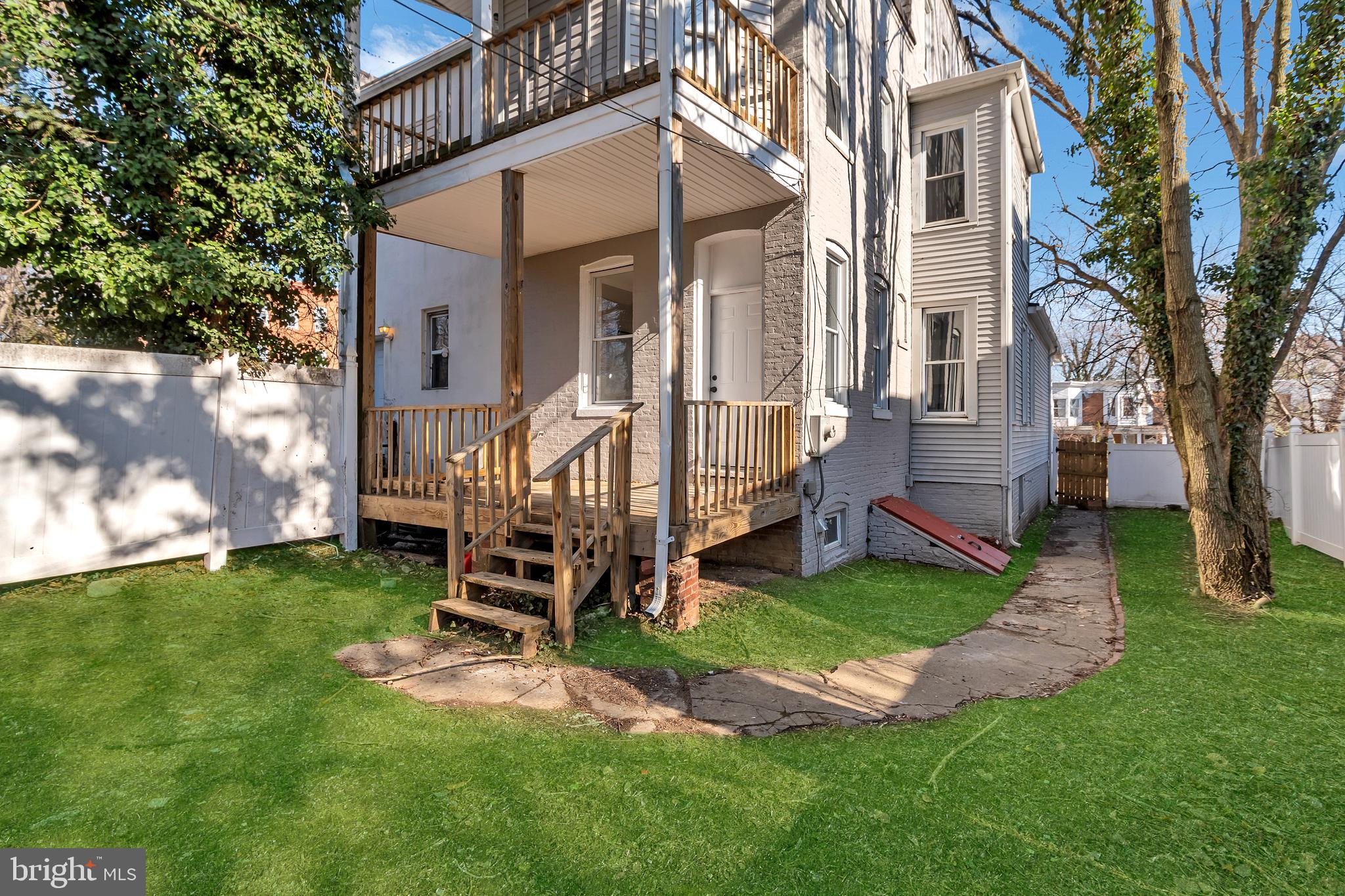 12 South Augusta Avenue Baltimore, MD 21229 - Photo 15 of 38 front view of a house with a yard