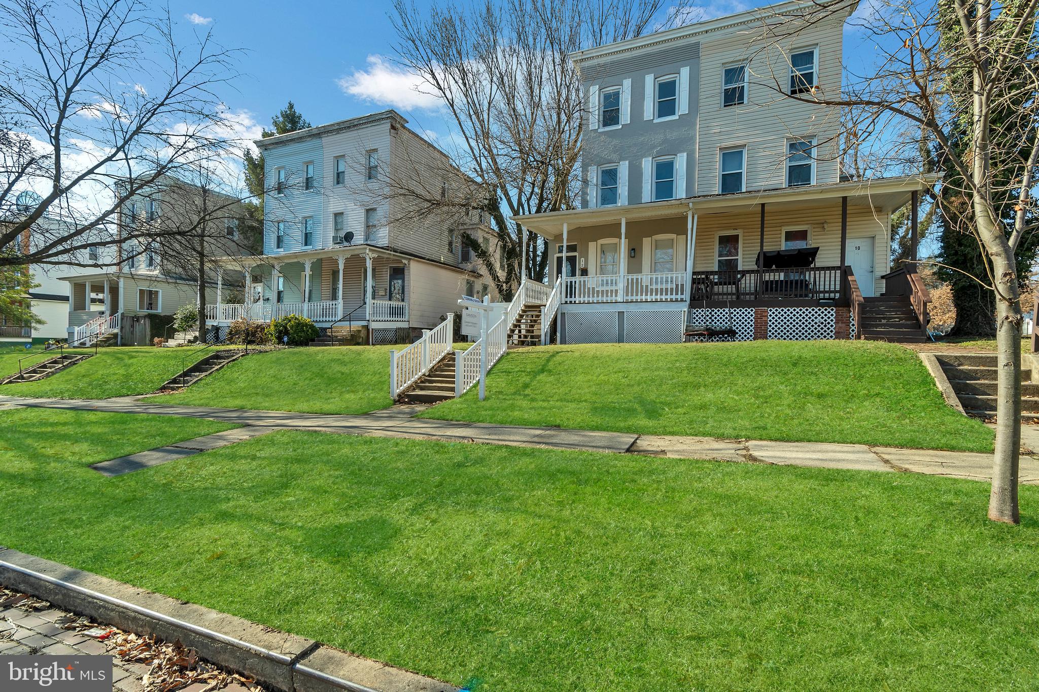 12 South Augusta Avenue Baltimore, MD 21229 - Photo 18 of 38 a view of a building with a yard