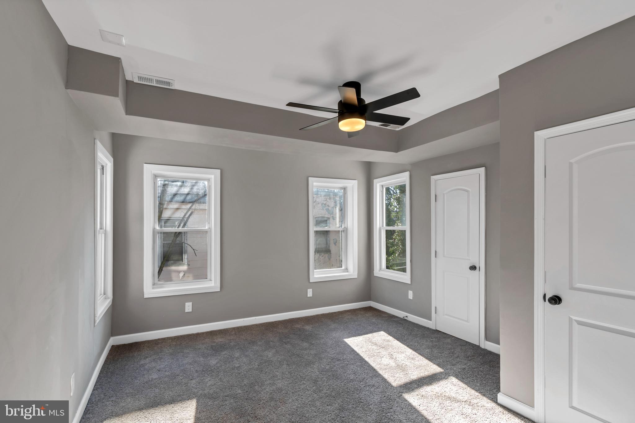 12 South Augusta Avenue Baltimore, MD 21229 - Photo 30 of 38 a view of an empty room with window and cabinet