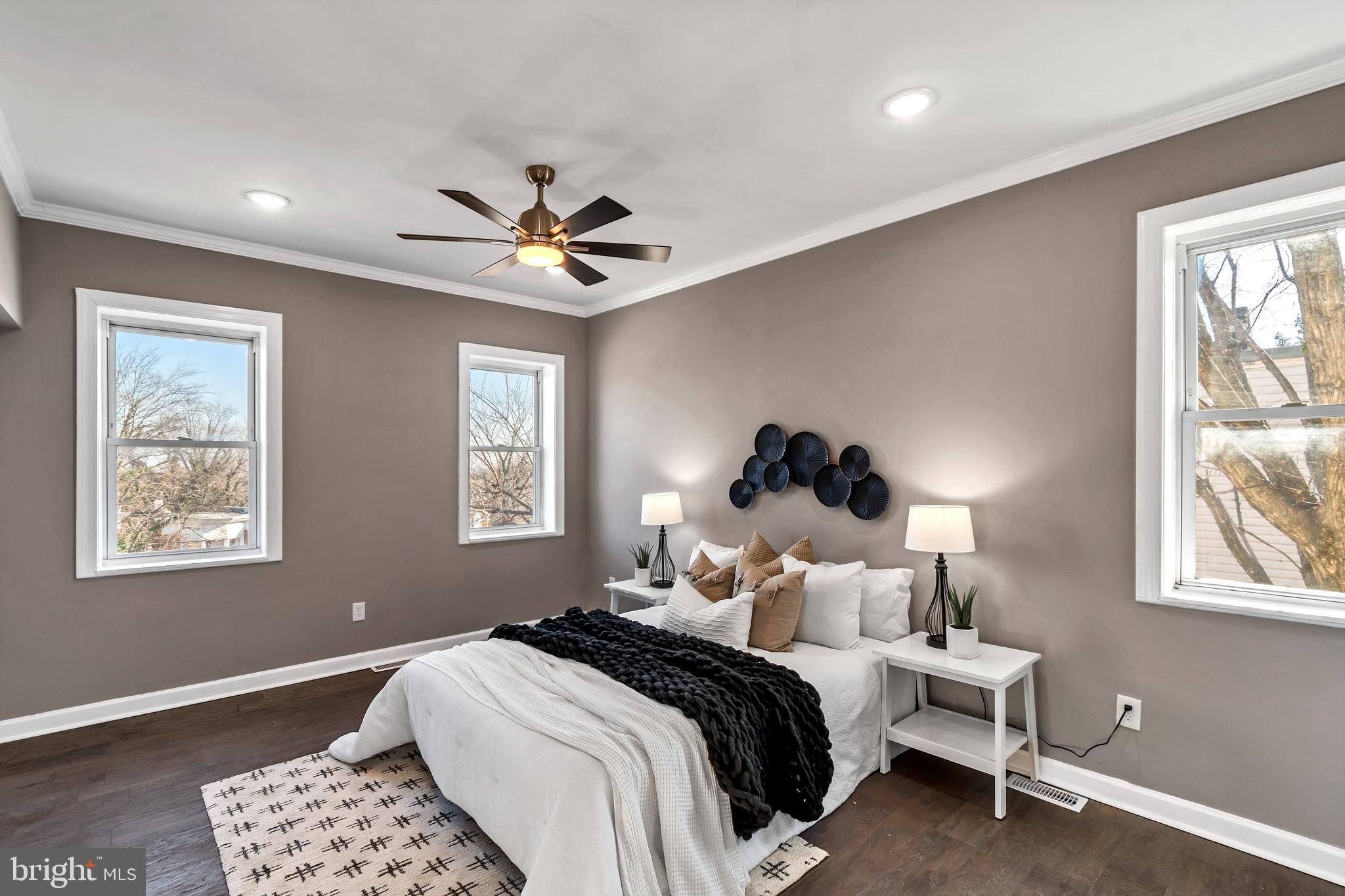 12 South Augusta Avenue Baltimore, MD 21229 - Photo 33 of 38 a bedroom with a bed and a window