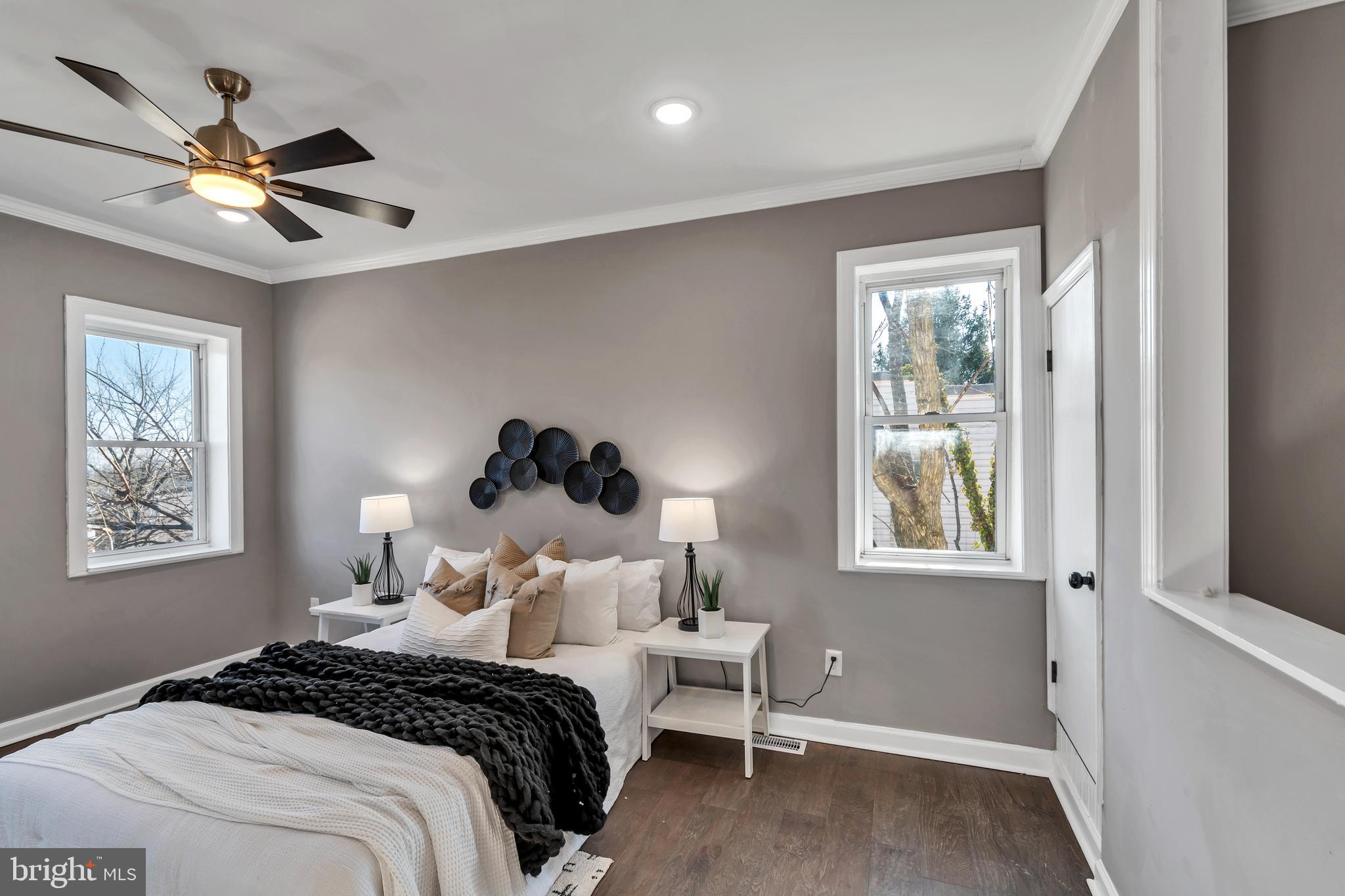 12 South Augusta Avenue Baltimore, MD 21229 - Photo 34 of 38 a bedroom with a bed and a window