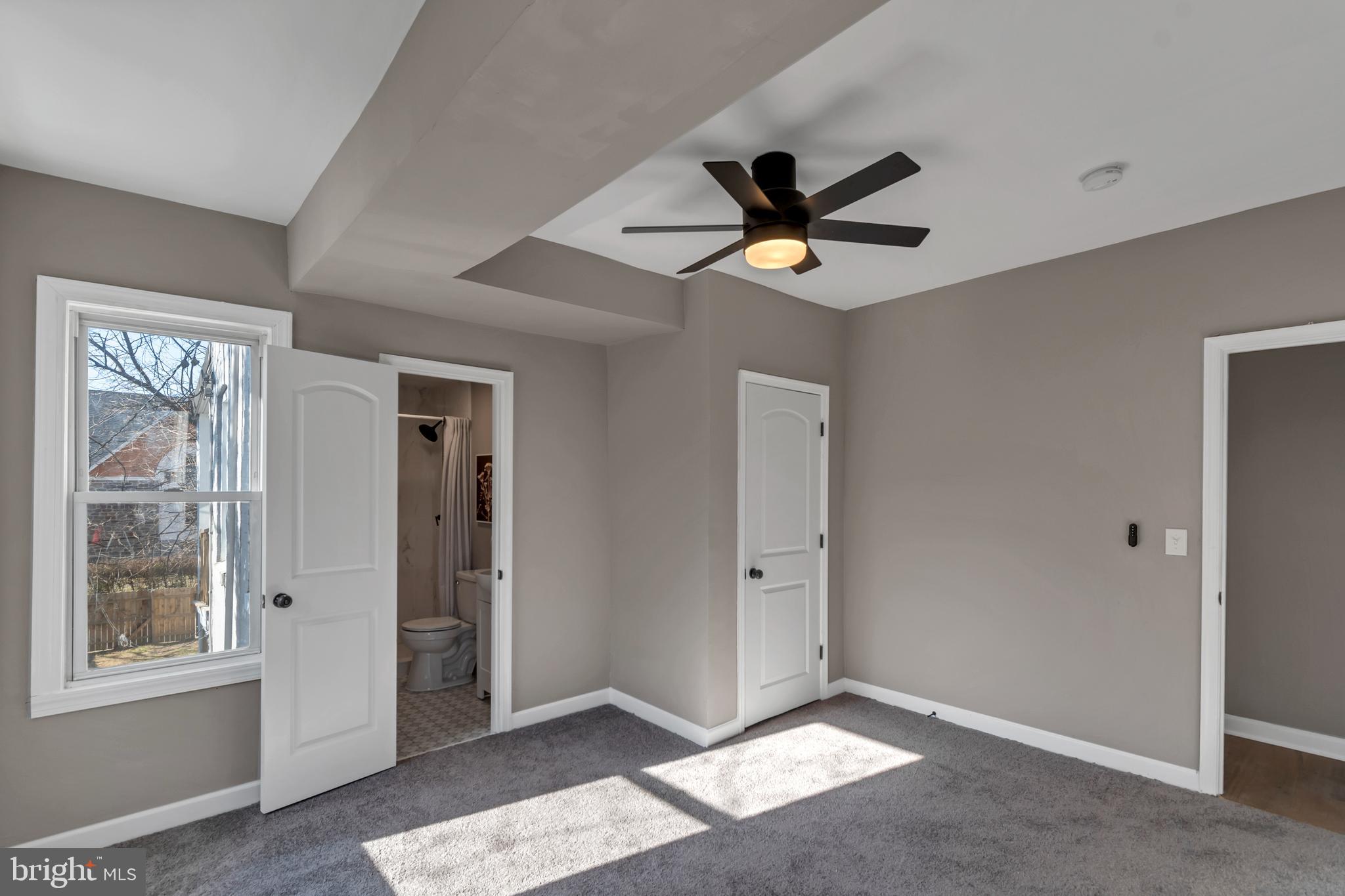 12 South Augusta Avenue Baltimore, MD 21229 - Photo 9 of 38 a view of an empty room with a window