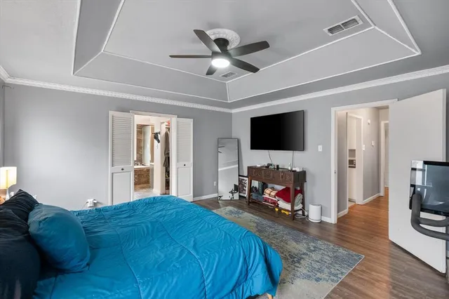 a living room with a flat screen tv and a fireplace