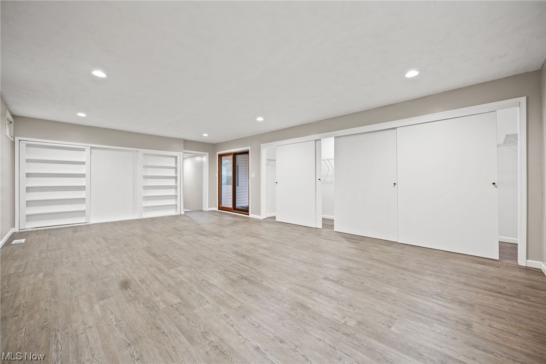 11417 Snow Road Parma Heights, OH 44130 - Photo 23 of 32 Primary bedroom featuring light vinyl flooring