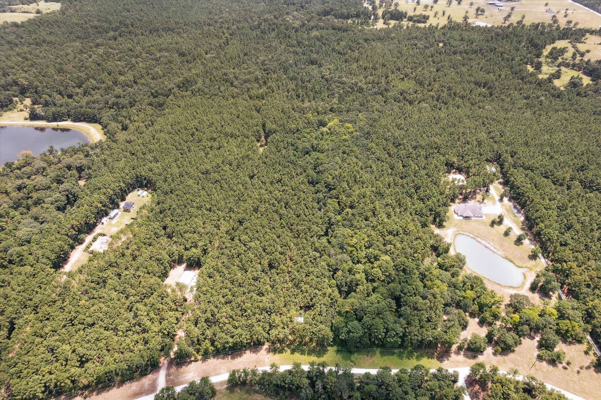 4970 Deep Forest Trail Navasota, TX 77868 - Photo 2 of 5 a bathroom with a sink and a mirror