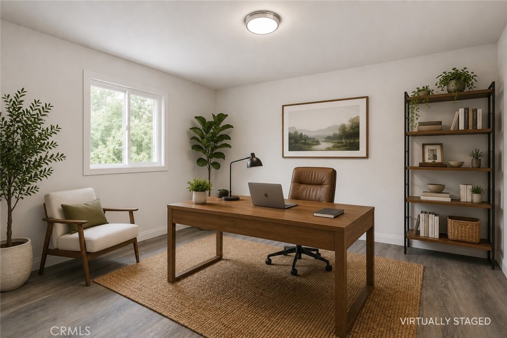 19451 Eagle Ridge Lane Porter Ranch, CA 91326 - Photo 42 of 59 a view of a workspace with furniture and a window