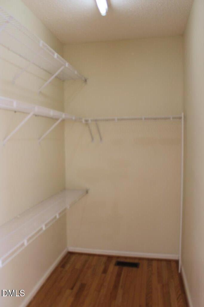 4717 Delta Lake Drive Raleigh, NC 27612 - Photo 11 of 20 a view of an empty walk in closet