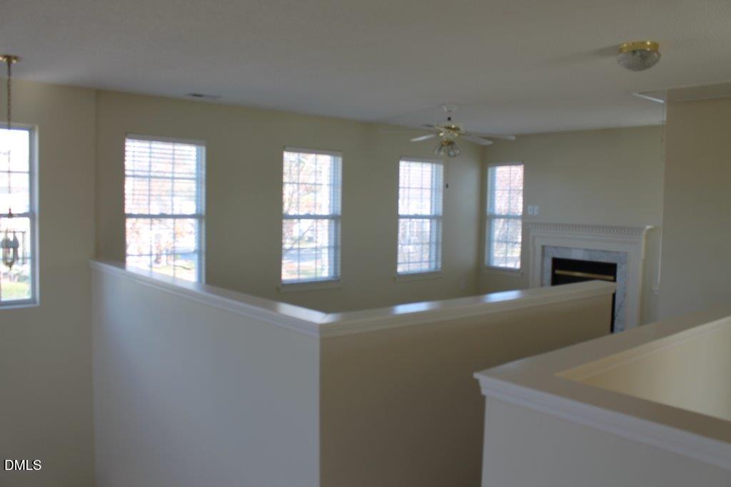 4717 Delta Lake Drive Raleigh, NC 27612 - Photo 13 of 20 a view of an empty room and window