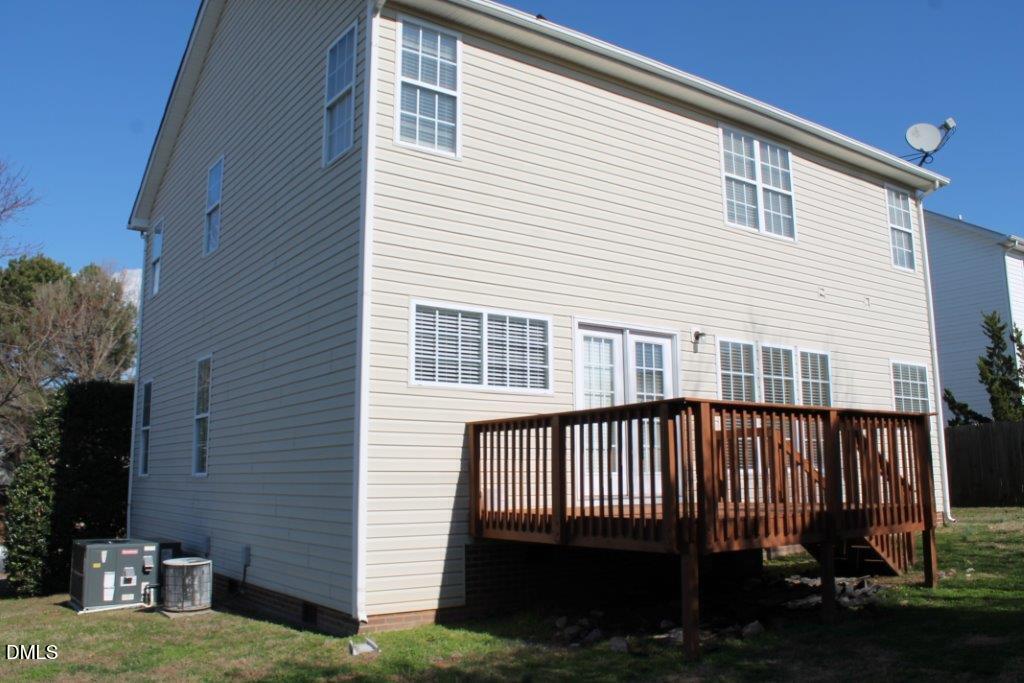 4717 Delta Lake Drive Raleigh, NC 27612 - Photo 19 of 20 a view of a house with a deck