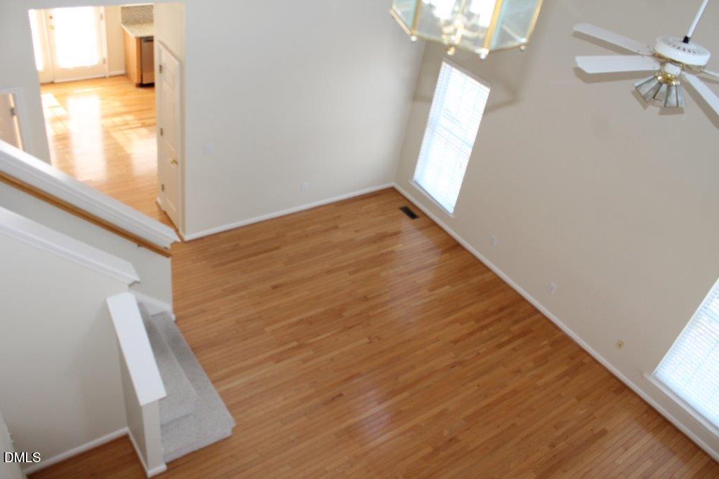 4717 Delta Lake Drive Raleigh, NC 27612 - Photo 3 of 20 a view of a hallway with windows