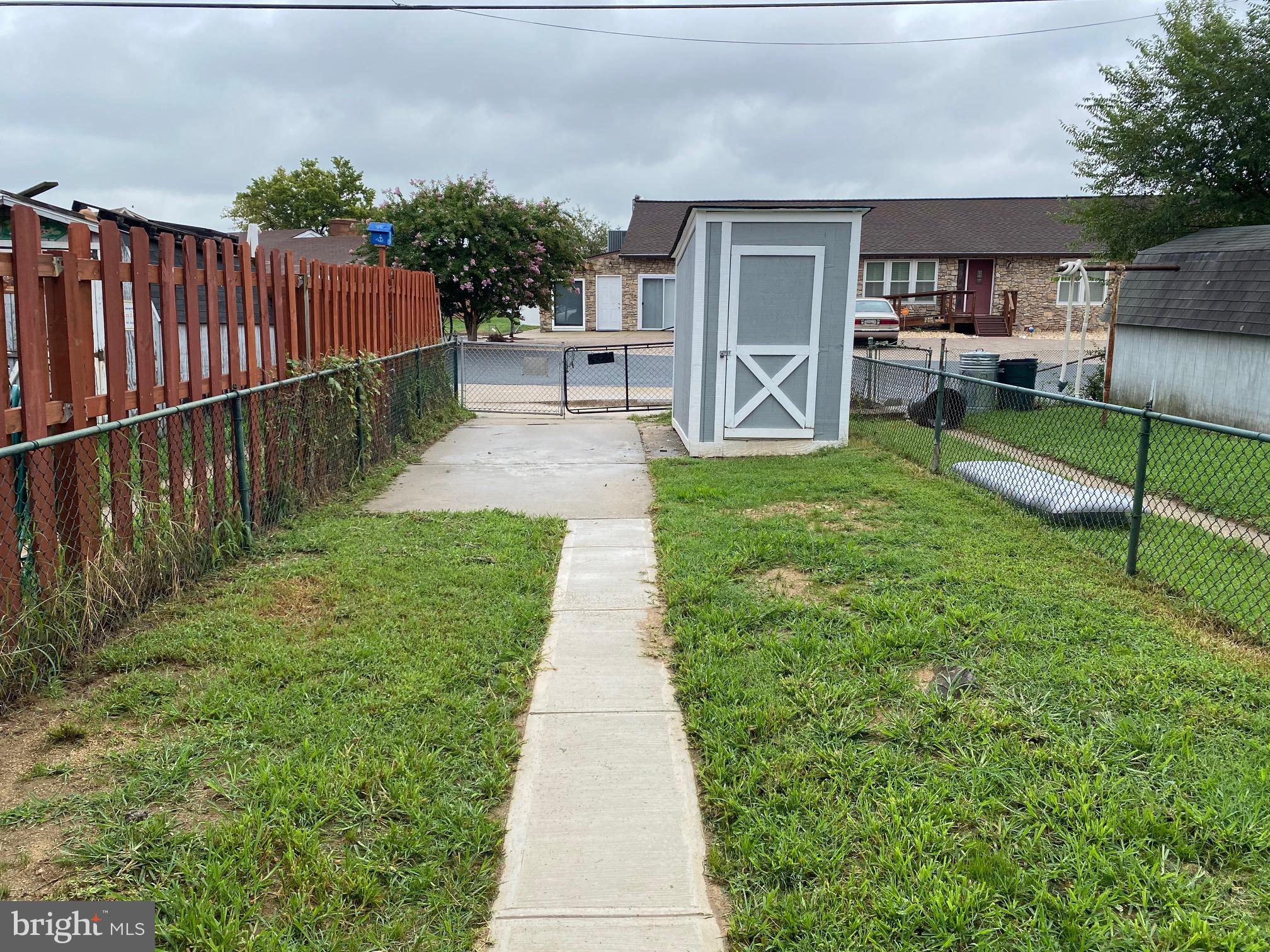 8522 Kavanagh Road Baltimore, MD 21222 - Photo 14 of 18 Rear yard parking pad & Shed