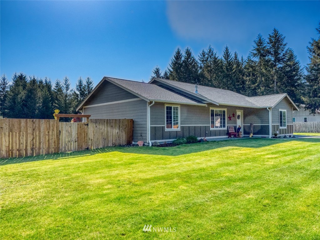 5125 180th Trail Southwest Rochester, WA 98579 - Photo 2 of 25 a view of a house with a yard