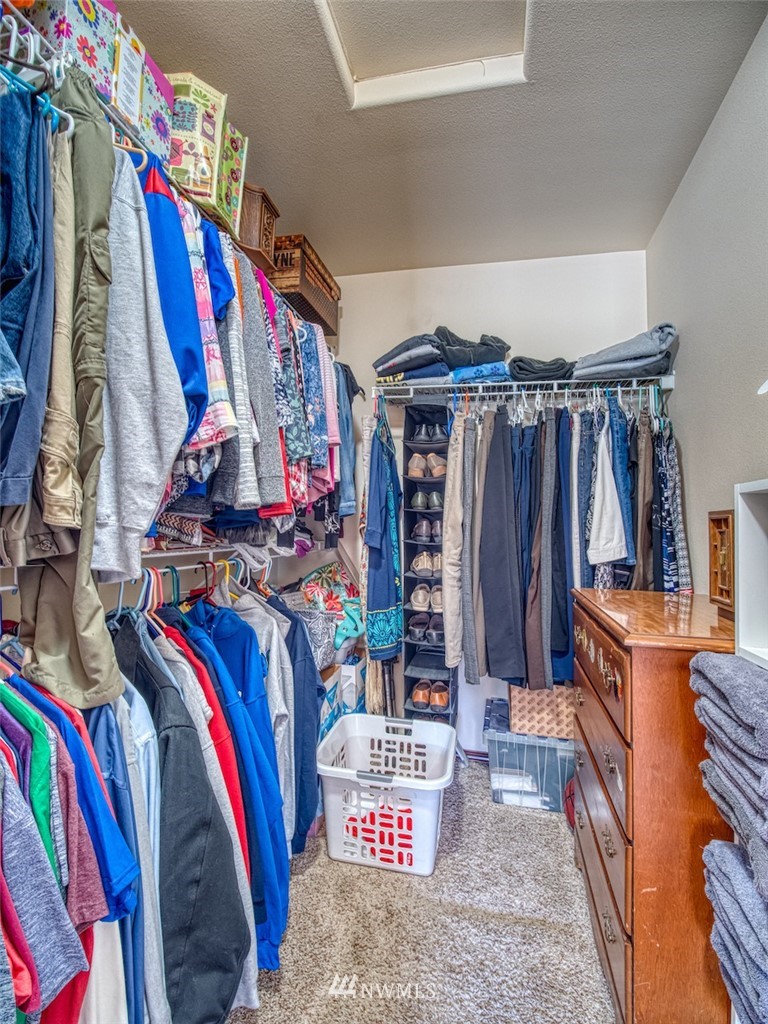 5125 180th Trail Southwest Rochester, WA 98579 - Photo 21 of 25 a view of walk in closet with clothes