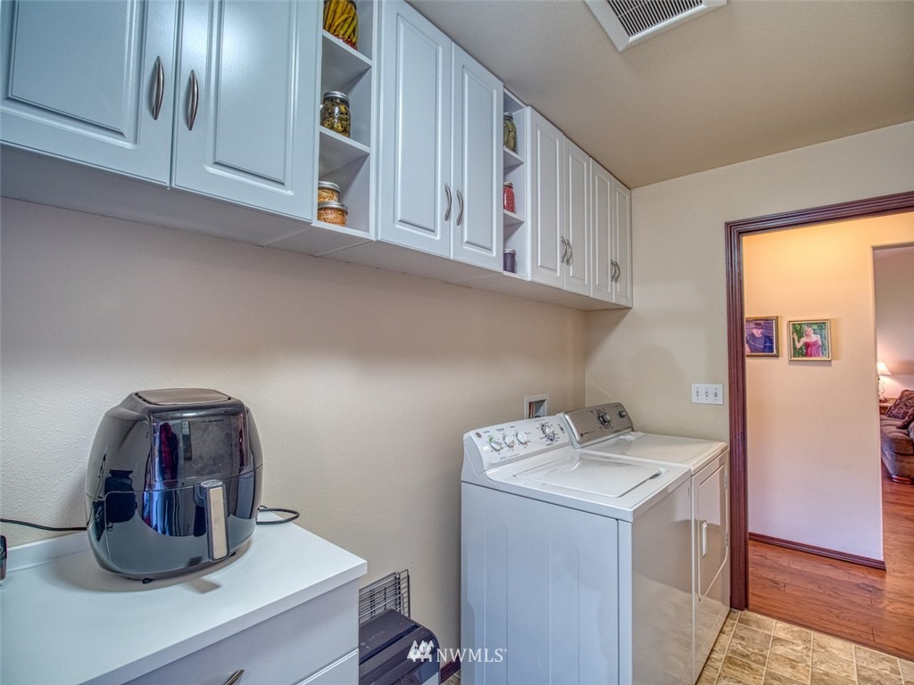 5125 180th Trail Southwest Rochester, WA 98579 - Photo 23 of 25 a room with storage and utility