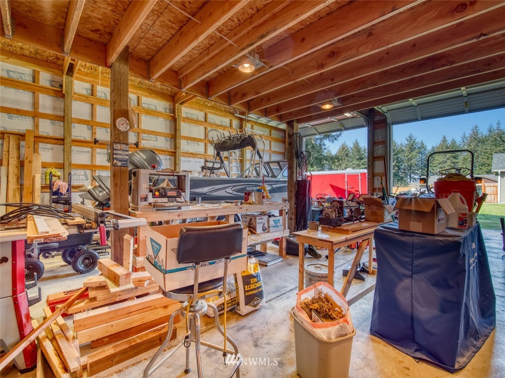 5125 180th Trail Southwest Rochester, WA 98579 - Photo 6 of 25 a outdoor living space with furniture and a flat screen tv