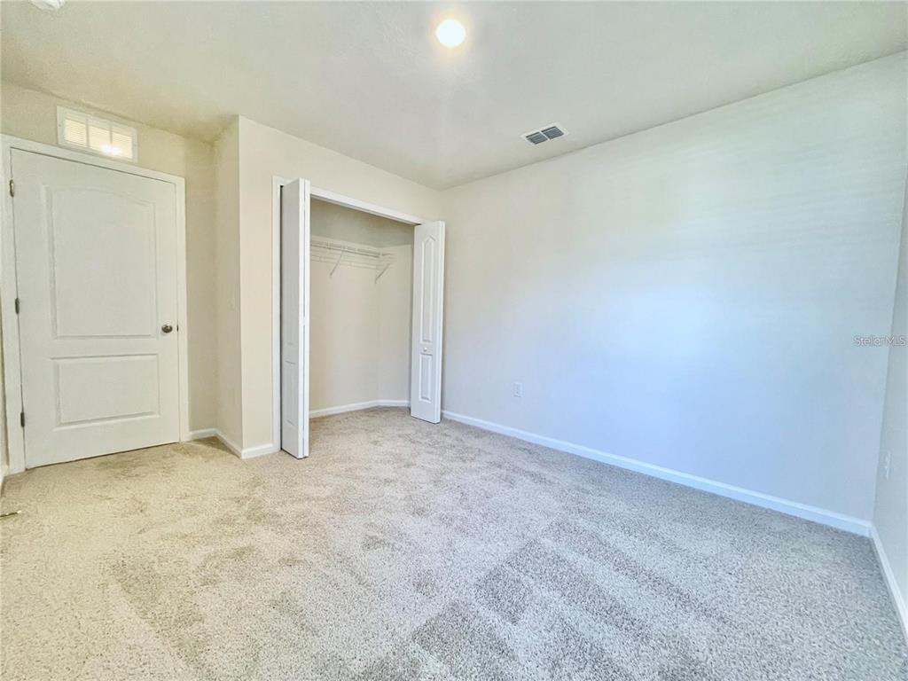 199 Redbud Road Palm Coast, FL 32137 - Photo 14 of 23 a view of an empty room