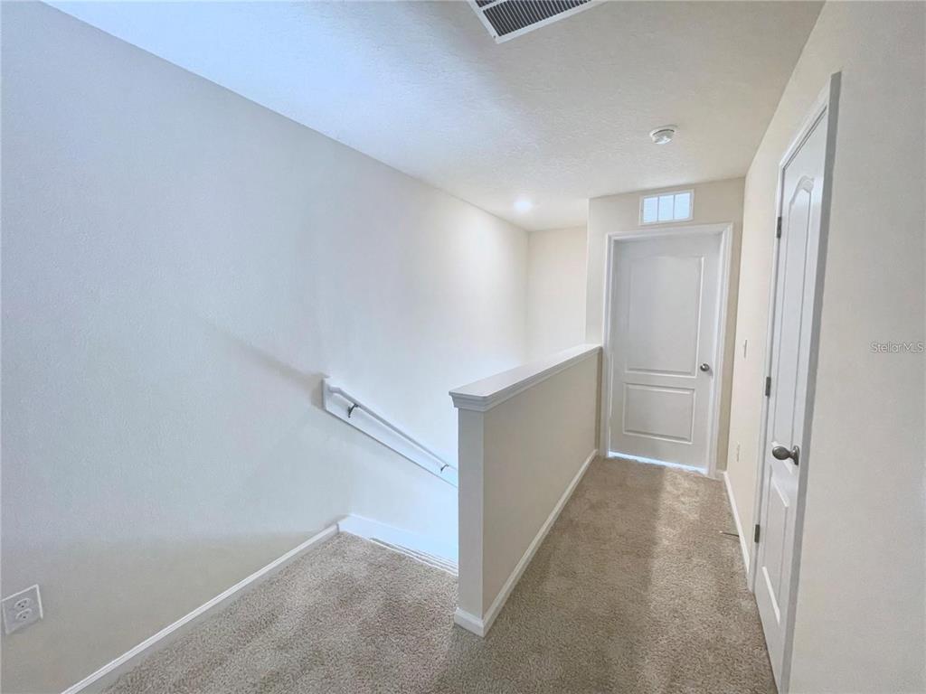 199 Redbud Road Palm Coast, FL 32137 - Photo 22 of 23 a view of hallway