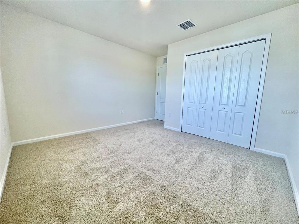199 Redbud Road Palm Coast, FL 32137 - Photo 10 of 23 a view of an empty room and entryway