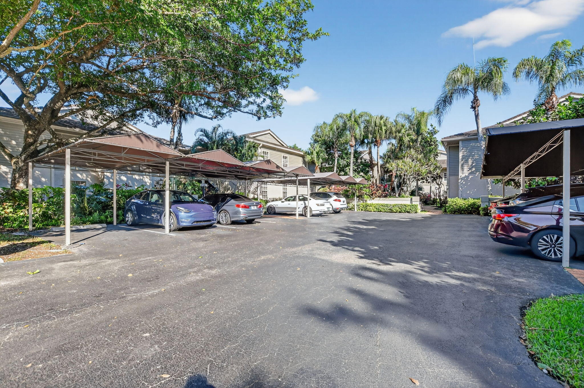 a view of street with parked cars