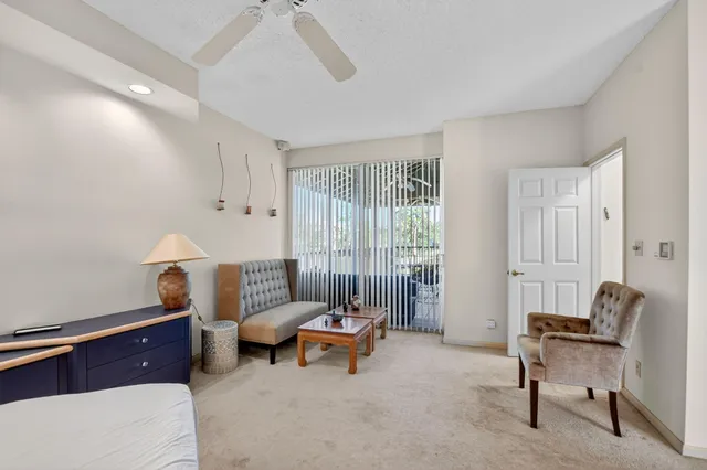 an aerial view of residential houses with outdoor space and street view